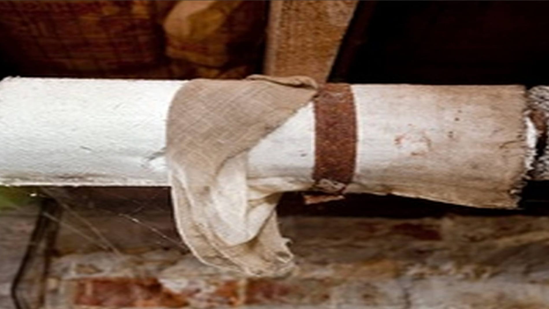 asbestos covered plumbing pipe.1900.1070